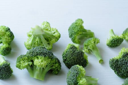 fresh raw  broccoli on white board, food closeupの写真素材