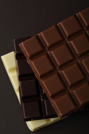 White, milky and dark chocolate bars, food close-upの写真素材