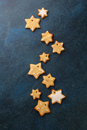 Christmas cookies on dark blue background, food topの写真素材