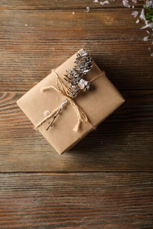 Holiday gift box in craft paper, christmas