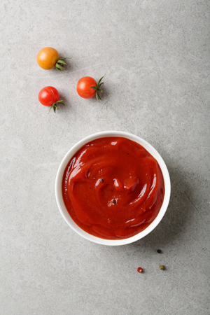 bowl with spice tomato sauce, food top viewの写真素材