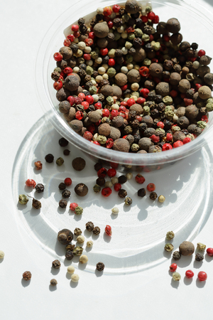 Color spice pepper on direct sunlight, seasoning
