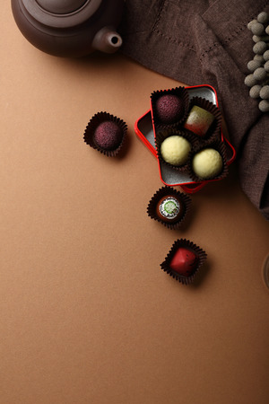 Teapot and candies, food aboveの写真素材