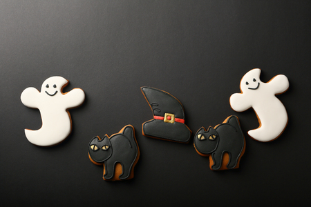 Black background Funny Halloween cookiesの写真素材