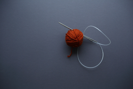 Knitting background with ball of woolの写真素材