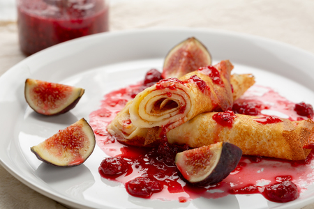 Breakfast crepes with jamの写真素材