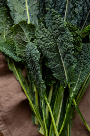 Green and fresh kale leaves, top viewの写真素材