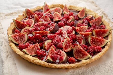 Chocolate tart with figs and raspberryの写真素材
