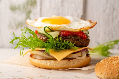 Burger with beef and eggの写真素材