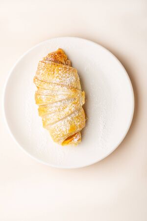 Fresh homemade croissant on plateの写真素材
