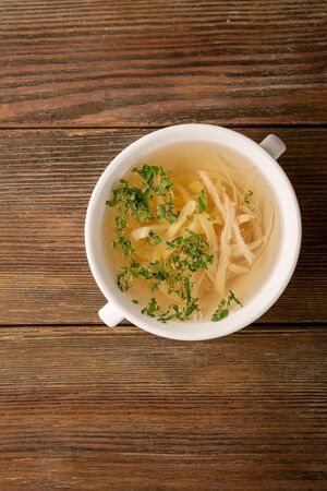 Bouillion with noodles and white meatの写真素材