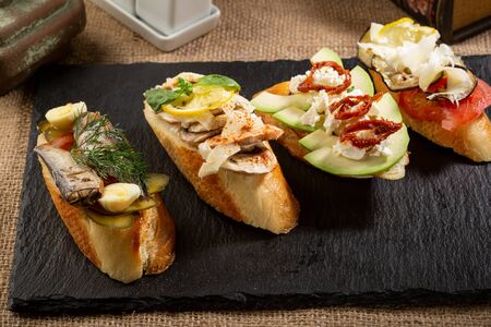 Italian bruschetta set on slateの写真素材