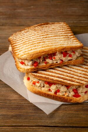 Two takeaway sandwiches on woodの写真素材