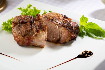 Braised meat on white plateの写真素材