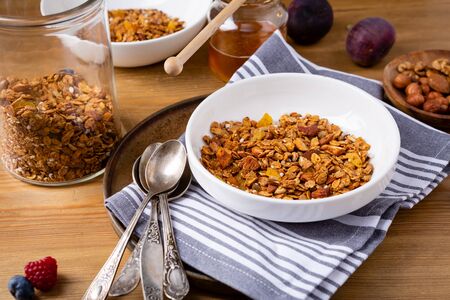 Granola in bowl and jar, foodの写真素材