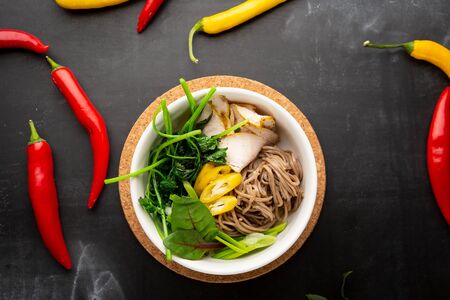 Spicy noodles in bowl top viewの写真素材