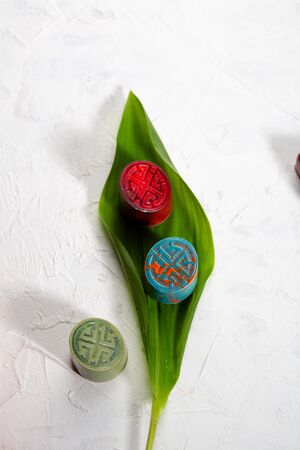 Chocolate bonbons and flowers leafの写真素材