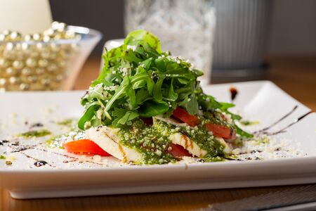 Fresh pesto salad on plateの写真素材