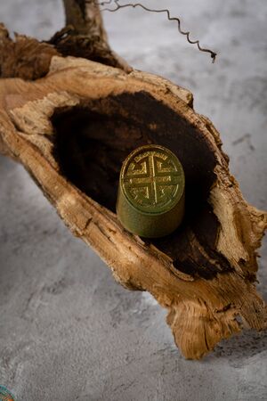 Chocolate bonbon close-up on woodの写真素材