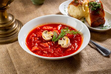 Cabbage and beetroot red soup with mushroomsの写真素材