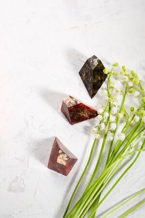 Chocolate bonbons and flowers topの写真素材