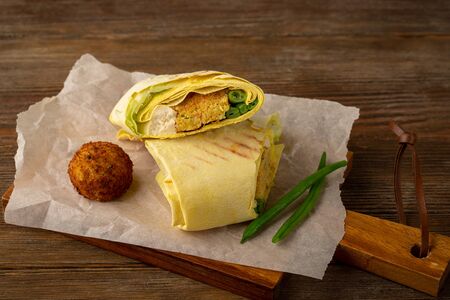 Pita with falafel and vegetables, healthy food close-upの写真素材