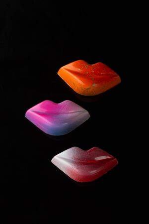 Candy lips for Valentineâs day holiday on blackの写真素材
