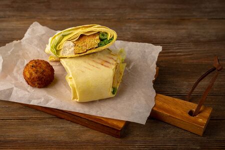 Pita with falafel and vegetables, food close-upの写真素材