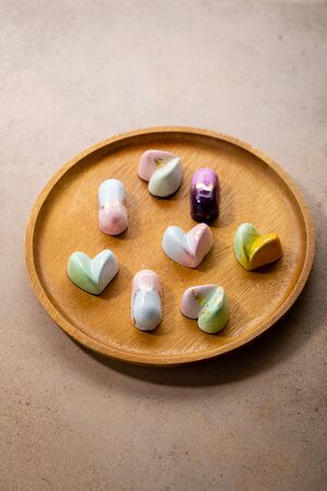 Collection modern chocolate candies on plateの写真素材