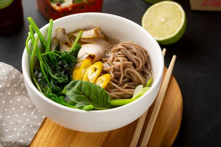 Bowl with buckwheat noodles and vegetablesの写真素材