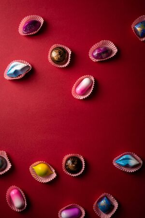 Candy set on red backgroundの写真素材