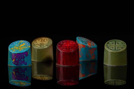 Modern chocolate candy collection on black backgroundの写真素材