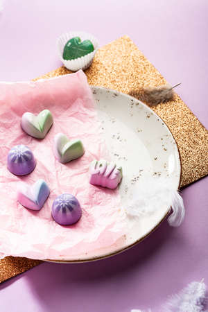 Sweet candies on white plate, sweet modern foodの写真素材