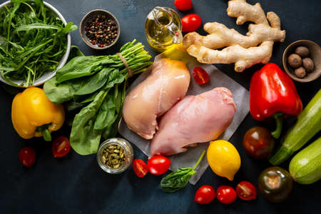 Raw meat and vegetables top view, cooking ingredientsの写真素材