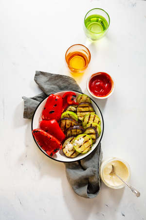 Raw various pasta and tomatoes overhead viewの写真素材