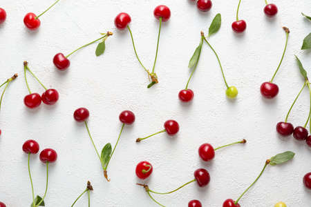 Organic summer cherry on white surface top viewの写真素材