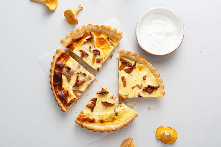 Overhead view of homemade chanterelles pie on tableの写真素材