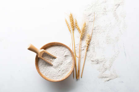 Overhead view of whole grain flour on light surfaceの写真素材