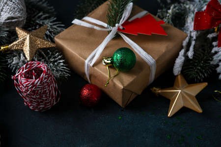 Close up of Christmas decoration, gift box, branches, holiday conceptの写真素材