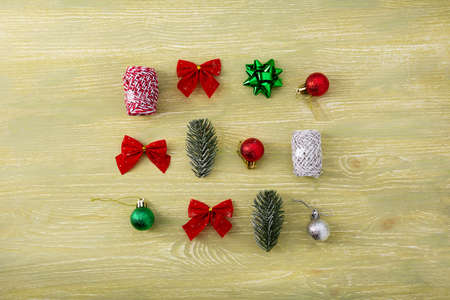 Christmas festive compositions on green wooden surface