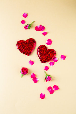 Composition with two red hearts and rosesの写真素材