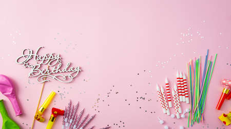 Overhead view of pink happy birthday concept background with candlesの写真素材