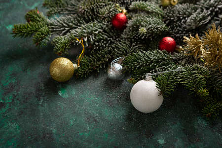 Close up of Christmas decorations on grenn surface holiday conceptの写真素材