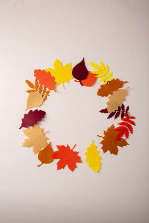 Wreath of felt autumn leaves craftの写真素材