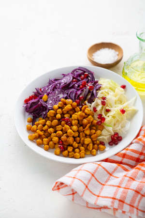 Winter salad with red cabbage and chick-peaの写真素材