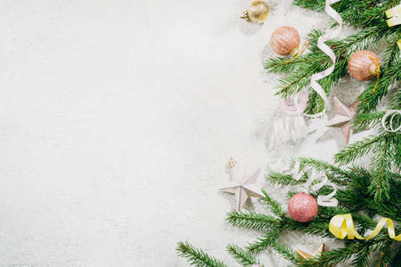 White winter holiday background with green branches decorations conceptの写真素材