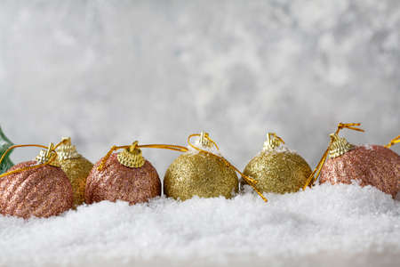 Christmas background with snow and balls holiday conceptの写真素材