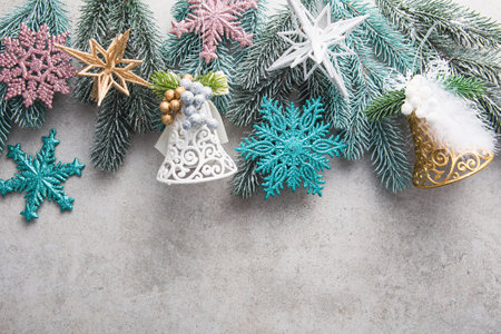 Christmas bell and snowflake decorations top view background festiveの写真素材