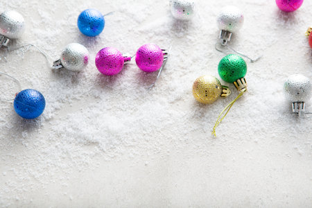Small Christmas decorations and snow copy spaceの写真素材