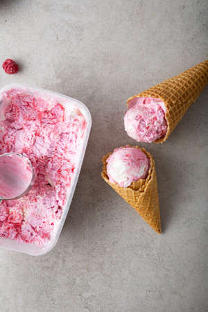 Two waffles cones with ice cream and box  food top viewの写真素材